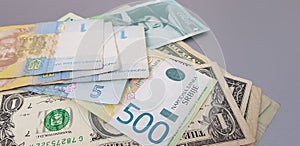 Close up of banknotes of hryvnia dynars and dollars