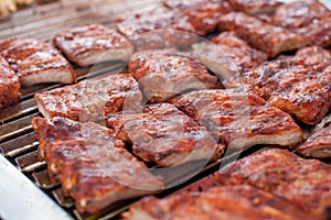 Close up of barbecue grill with delicious spare ribs.