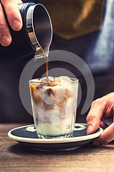 Close-up a barista making fres ice coffee on barcounter