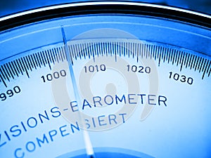 Close up of a barometer blue toned