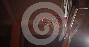 Close-up Basket Basketball Ball Slam Dunk Caucasian Player Jump Ray of Light