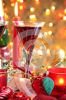 Close-up of bauble,candle and red wine.