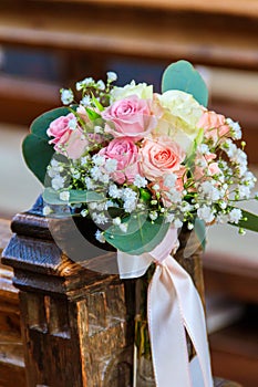 Close-up of beautiful flower wedding decoration in church