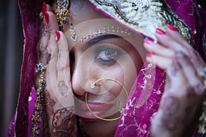 Close up Beautiful indian girl Young hindu woman model with kundan jewelry. photo