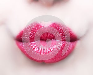 Close-up of beautiful kissing lips of woman.