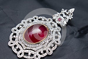 Silver handmade pendant with giant ruby