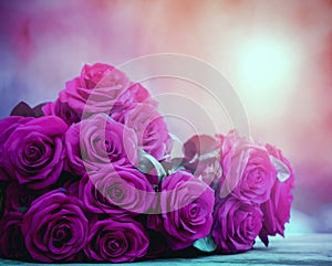 close up beautiful pink roses bouguet with glowing light background