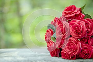 close up beautiful red roses bouquet with glowing light background for valentine day and love theme