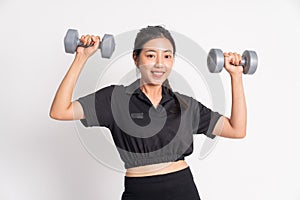 close up of beautiful woman lifting dumbbells exercising shoulder muscles