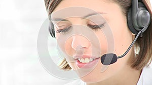 Close up of beautiful woman working in a call center
