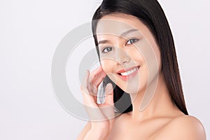 Close up Beautiful Young asian Woman with Clean Fresh Skin, on white background, Face care, Facial treatment, Cosmetology, beauty