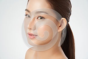 Close up Beautiful Young asian Woman with Clean Fresh Skin on white background, Face care, Facial treatment, Cosmetology, beauty