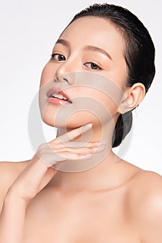Close up Beautiful Young asian Woman touching her clean face with fresh Healthy Skin, isolated on white background, Beauty
