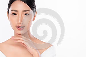 Close up Beautiful Young asian Woman touching her clean face with fresh Healthy Skin, on white background, Beauty Cosmetics and