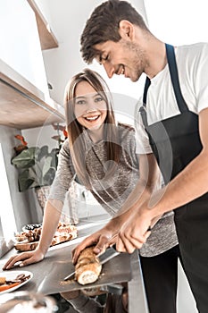 Close up. beautiful young couple preparing Breakfast togethe