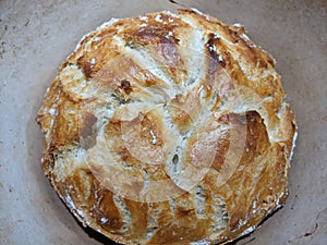 A close-up of beautifully cooked fresh artisan bread cooling
