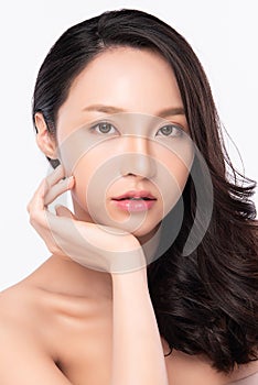 Close up Beauty face. Smiling asian woman touching healthy skin portrait. Beautiful happy girl model with fresh glowing hydrated