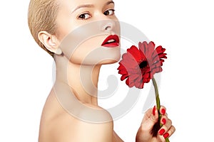 Close-up beauty photo woman with red lips, lipstick and beautiful red flower. Spa clean skin