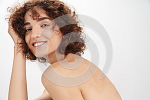 Close up beauty portrait of an attractive young topless woman