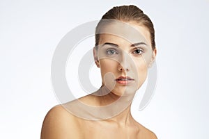 Close-up beauty portrait of a young woman.