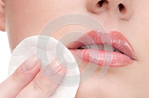 Close-up of beauty woman applying sponge