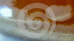 Close up of beer bubbles 4k video