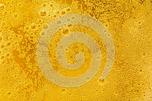 Close up of beer bubbles and foam as a background