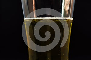 Close-up of beer pint with free space for text. Abstract beverages background