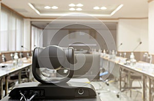 Close up behind camera video conferencing in meeting room