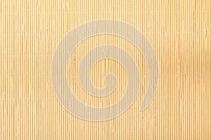 Close up beige brown bamboo mat striped background texture pattern