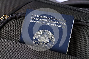 Close up of Belarus Passport in Black Suitcase Pocket