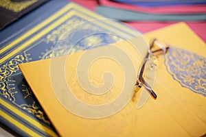 Old spectacles on bespoke book covers