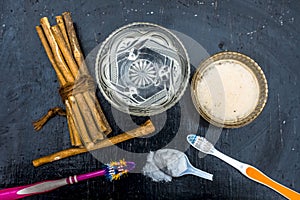 Close up of best and trusted home remedy for Tooth problems and yellow teeth i.e. baking soda with water and normal tooth brush it