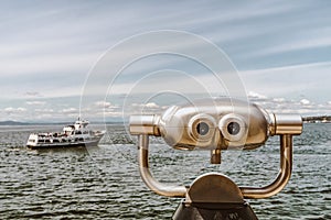 Close-up of  binoculars on the Seattle waterfront along Elliott Bay, Washington state, USA