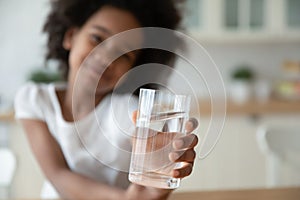 Close up of biracial child recommend water drinking