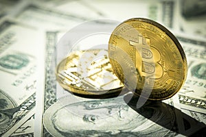 Close-up Bitcoins on dollar banknote; Crytocurrency concept