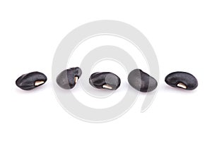 Close up black beans isolated on white
