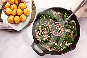 Close up of black-eye peas and collard greens