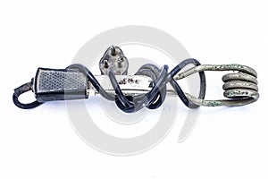 Close up of black handled immersion rod or immersion water heater isolated on white.