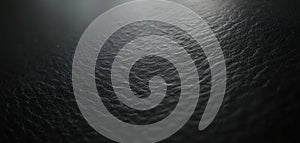 Close-up black leather texture background with rough surface. Dark material pattern with structure details. Luxurious backdrop