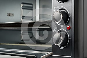 Close up of black mini electric oven home appliance
