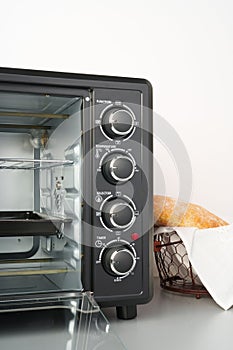 Close up of black mini electric oven home appliance