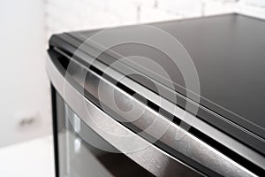 Close up of black mini electric oven home appliance