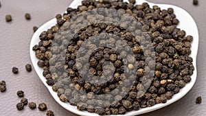 Close up black pepper seeds or peppercorns dried seeds of piper nigrum