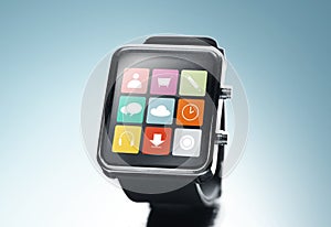 Close up of black smart watch with app icons