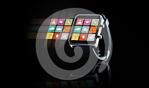 Close up of black smart watch with app icons