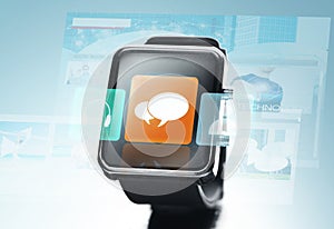 Close up of black smart watch with messenger icon