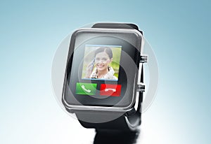 Close up of black smart watch with video call icon