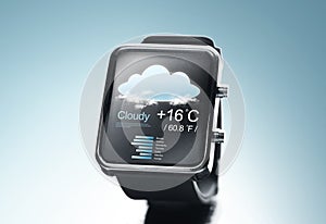 Close up of black smart watch with weather app