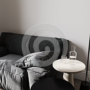 close up of black sofa with black coffee table in bright room with white wall, 3d rendering